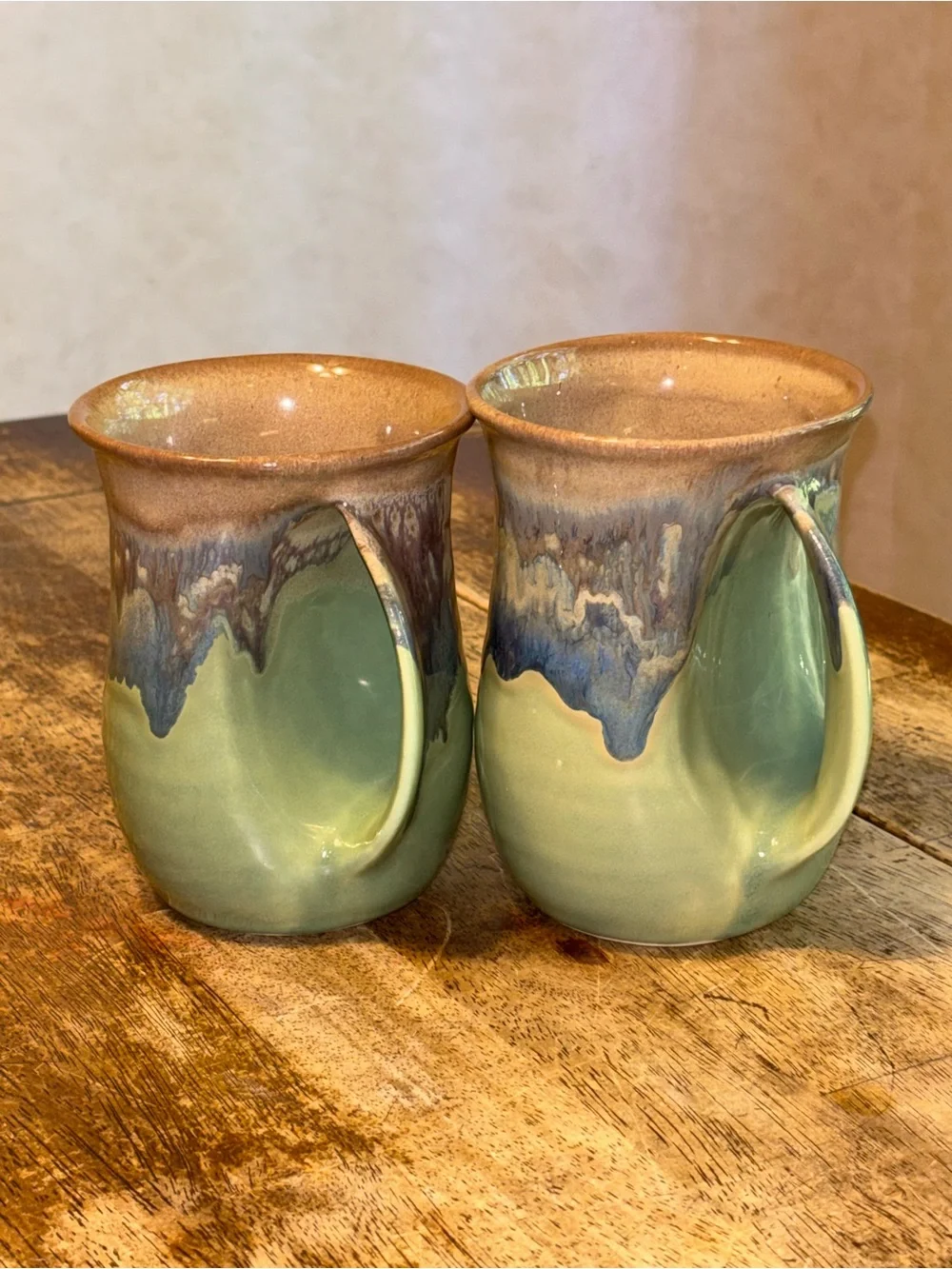 2013 & 2017 Neher Clay in Motion Mossy Creek Pottery Hand Warmer Mugs - Set of 2